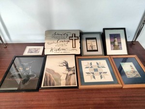 This collection of wall art features a rustic wood-framed sign with the Serenity Prayer as its central piece.