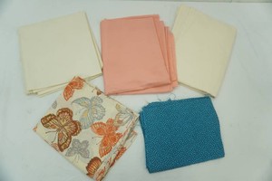 turquoise and dark blue silk fabric 120 x 36, vintage butterfly motif fabric 36 x 80, coral cotton fabric 44 x 72, crisp cotton fabric 44 x 316, unbleached cotton fabric 88 x 64, unbleached cotton fabric 44 x 72