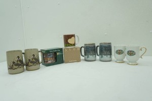 group of collectible stoneware mugs