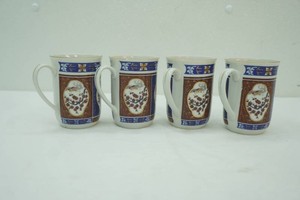 set of 4 vintage Interpur mugs with intricate brocaed-style pattern in red, blue,and gold