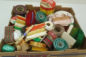 large assortment of gift wrap bows, craft and sewing bows