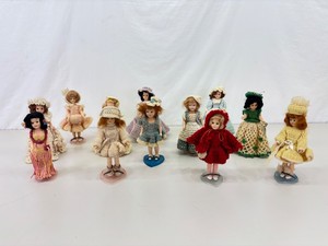 Collection of 12 Nancy Ann Dolls with Hand Knitted Outfits&nbsp