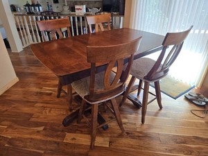 Counter Height Dining Table with Four Upholstered Swivel Chairs