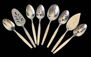 K - Eight Vintage Stainless Serving Utensils by Community