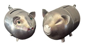 LR - Two Vintage Metal Piggy Banks