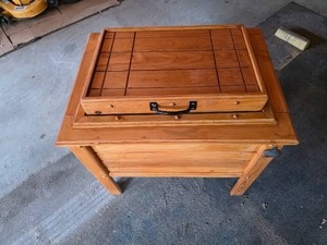 Beautiful stained, custom-made cooler housed in a solid, knotty pine stand