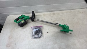 Battery Powered String Trimmer With Extra Blades