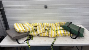 Four Lifejackets And Two Boat Cushions