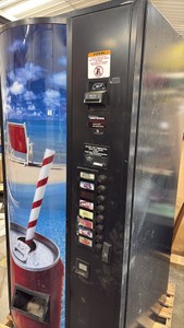 Pop machine with key