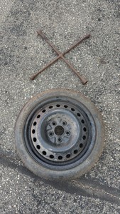 Spare tire and wheel wrench