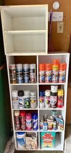 Large lot of Spray Paint, White Shelving and other Supplies.