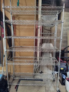 Two Adjustable Wire Shelving Units on Wheels