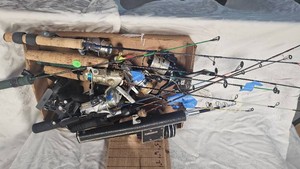 Lot of Ice Fishing Poles as Pictured