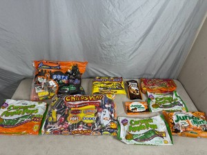 Assorted Candy, Junior Mints, Dots, Fruit Chews, Caramel Apple Pops, Charleston Chew, and More.