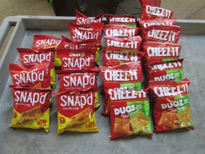 22 4.3 oz and 2.2 oz bags of Cheezi...
