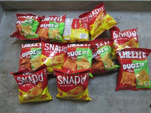 12 4.3 oz and 2.2 oz bags of Cheezi...