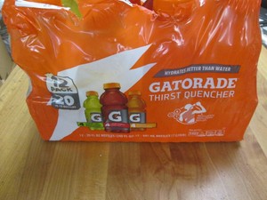 12 Assorted Gatorade 20 oz bottles...