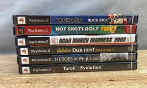 6 PlayStation 2 Video Games - Hot Shots Golf, NCAA March Madness, Turok, Heros of Might and Magic, Rock Band, Cabelas Deer Hunt&nbspC