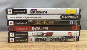 6 PlayStation 2 Video Games - Gran Turismo, Ghost Recon, The Lord of the Rings, Major League Baseball 2K7, NHL 2002, Guitar Hero&nbspC