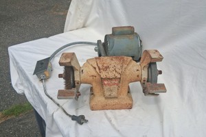 WISSOTA GRINDER WITH MOTOR AND NICE BELT.  WORKS