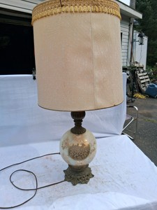 FANCY BRASS FOOTED AND GLASS LAMP