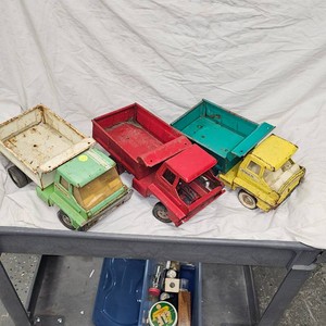 Lot of Three Structo Dump Trucks