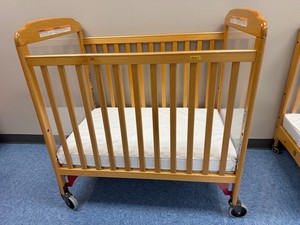 Wooden Daycare Baby Crib With Mattresses on Casters. Retails for $375