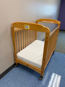 Wooden Daycare Baby Crib With Mattresses on Casters. Retails for $375