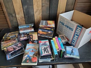 Large lot of Dvds Cds and VHS Tapes