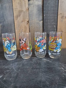 4 1983 Collectable Smurf Glasses