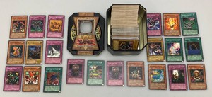 Group Of Unsorted Yu-Gi-Oh Trading Cards In Tin
