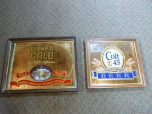 Two Mirrored Beer Signs