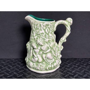 Green White Ceramic Pitcher with Raised Floral Relief