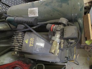 The Bull MDL-FC2092 dual tank air compressor