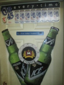 Colt 45 Malt Liquor and Molson Ice Tim door signs