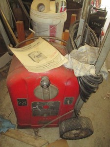 Lincoln Electric Lincwelder 180ac welding machine on portable cart with attachments shown