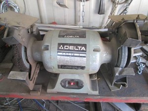 Delta 8in bench grinder Buyer must bring tools for removal