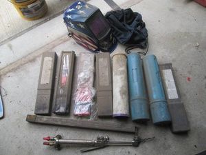 Smiths torch head, Miller welding helmet and a wide selection of welding electrode rods