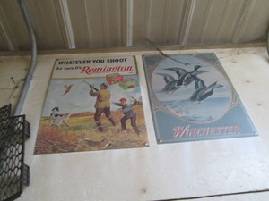 Remington and Winchester tin signs