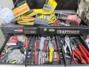 Content on top and in 3 top drawers of toolbox to include a variety of hammers, assorted pliers, screwdrivers, utility knives and more