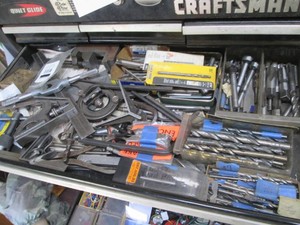 Content of toolbox drawer to include specialty clamps, deburring bits, drill bits, tap and die components with other misc shown