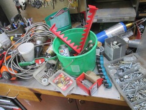 Hardware organizer, specialty craftsman wrenches, c-clamps, Cobalt drill bits, protective outdoorsman earmark, rubber mallet, impact sockets, plus misc hand tools and hardware