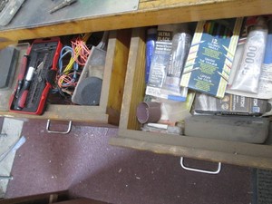 Content of 2-drawers to include misc adhesives, exacto knife, sharpening stones and other misc shown in pics