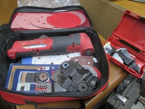 Milwaukee fuel m12 12v multi-tool with accessories in soft side zip case (no battery or charger)