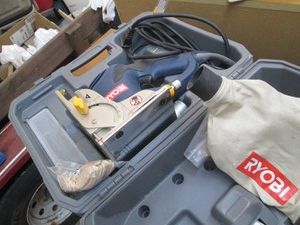 Ryobi biscuit joiner in hardside case with accessories shown