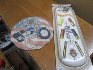 Winchester ammunition thermometer and motorcycle wall plaque