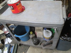 Rubbermaid style 2-tier shop cart with assorted content