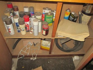 Content of cabinet to include a large assortment of spray paints and assorted paint related chemicals