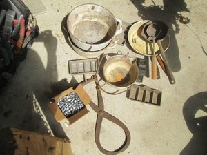 Variety of lead melting pots, molds and other materials