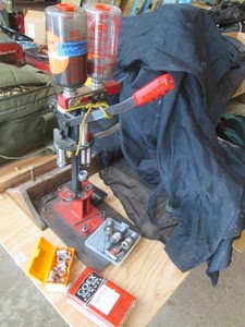 NEC outdoors ammunition reloaded with supplies and accessories shown